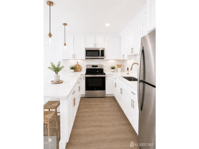 Freshly and meticulously renovated in 2026, this exceptional - photo 6