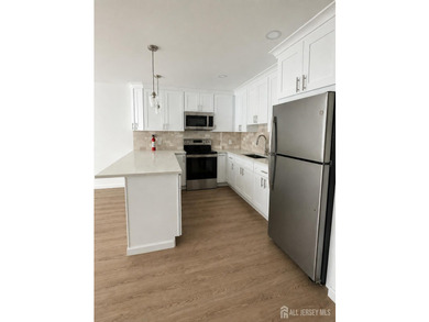 Freshly and meticulously renovated in 2026, this exceptional - photo 7