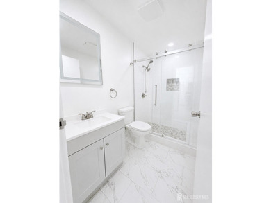 Freshly and meticulously renovated in 2026, this exceptional - photo 10