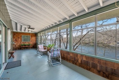 Escape to this idyllic lake front home offering breathtaking - photo 13