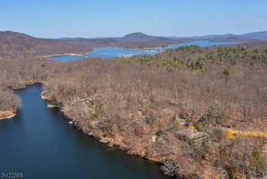 Escape to this idyllic lake front home offering breathtaking - photo 20