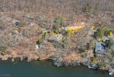Escape to this idyllic lake front home offering breathtaking - photo 21