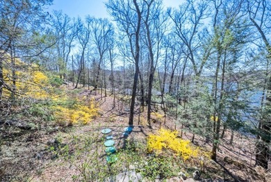 Escape to this idyllic lake front home offering breathtaking - photo 22