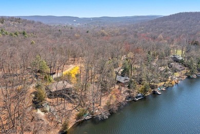 Escape to this idyllic lake front home offering breathtaking - photo 23