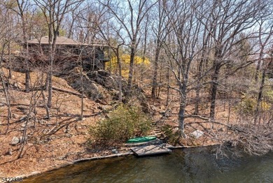 Escape to this idyllic lake front home offering breathtaking - photo 24