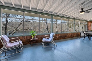 Escape to this idyllic lake front home offering breathtaking - photo 31