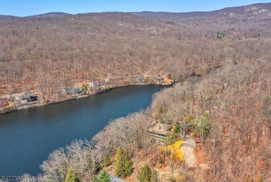 Escape to this idyllic lake front home offering breathtaking - photo 32