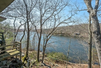 Escape to this idyllic lake front home offering breathtaking - photo 33