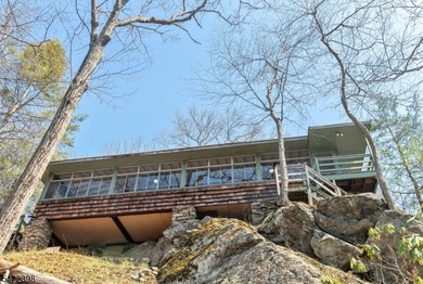Escape to this idyllic lake front home offering breathtaking - photo 34