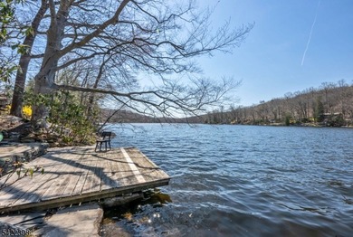 Escape to this idyllic lake front home offering breathtaking - photo 35