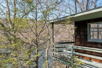 Escape to this idyllic lake front home offering breathtaking - photo 37