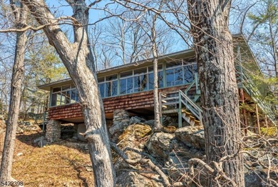 Escape to this idyllic lake front home offering breathtaking - photo 38