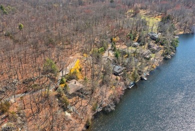 Escape to this idyllic lake front home offering breathtaking - photo 40
