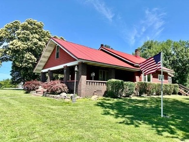 Situated on 5.2 acres+/- with stocked pond and country living - photo 2