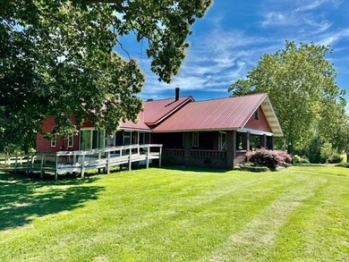 Situated on 5.2 acres+/- with stocked pond and country living - photo 3