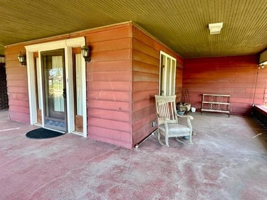 Situated on 5.2 acres+/- with stocked pond and country living - photo 5