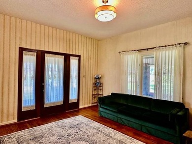 Situated on 5.2 acres+/- with stocked pond and country living - photo 8
