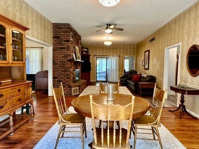 Situated on 5.2 acres+/- with stocked pond and country living - photo 9