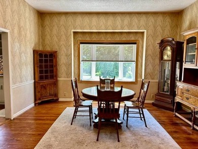 Situated on 5.2 acres+/- with stocked pond and country living - photo 10