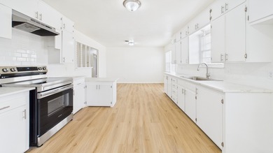 Welcome to this beautifully remodeled, three bedroom, one bath