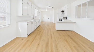 Welcome to this beautifully remodeled, three bedroom, one bath