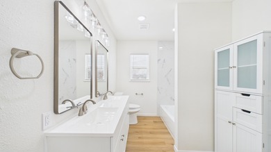 Welcome to this beautifully remodeled, three bedroom, one bath