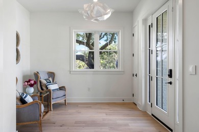 This stunning, corner unit, 3 bedroom, 3.5 bath townhome is