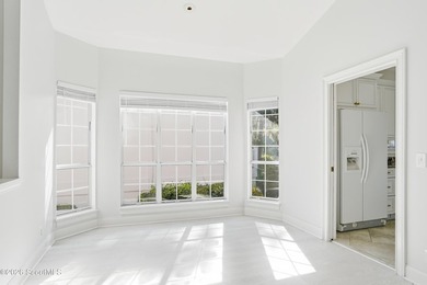 Tucked away in the highly sought-after Turtle Point neighborhood - photo 7