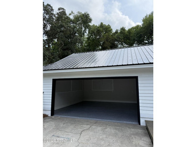 This house is totally remodeled new paint inside and out new - photo 2