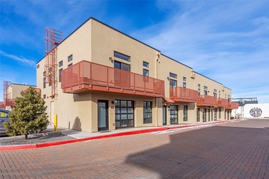 Corner unit with a wraparound balcony and mountain views in