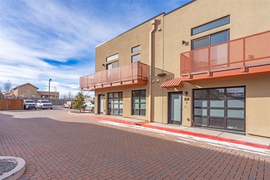 Corner unit with a wraparound balcony and mountain views in