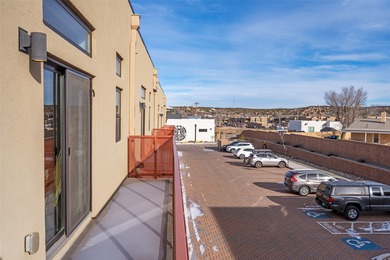 Corner unit with a wraparound balcony and mountain views in