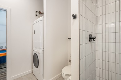 Corner unit with a wraparound balcony and mountain views in