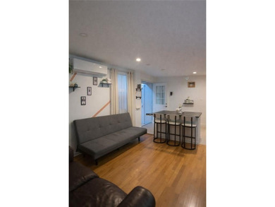 A beautifully renovated two-family residence in the heart of - photo 4
