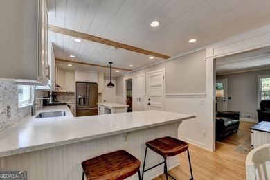 Your private lakeside retreat awaits. Set on spacious acreage in - photo 22