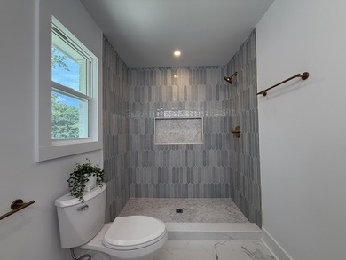 This 2,950-square-foot home has been completely rebuilt through - photo 25