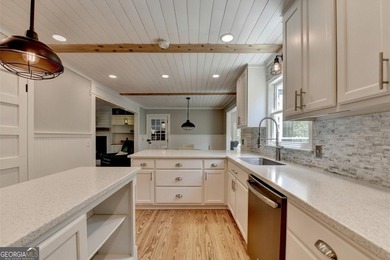 Your private lakeside retreat awaits. Set on spacious acreage in - photo 28