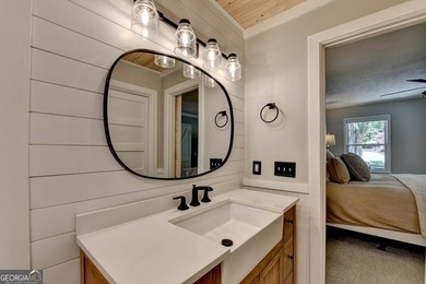 Your private lakeside retreat awaits. Set on spacious acreage in - photo 37