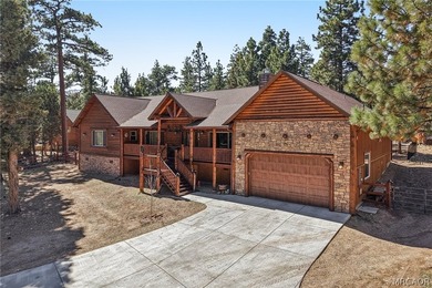 Majestic log-style mountain masterpiece located in the exclusive - photo 2