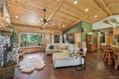 Majestic log-style mountain masterpiece located in the exclusive - photo 6