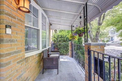 Welcome to 90-10 69th Avenue - a private, detached 2-family home - photo 2
