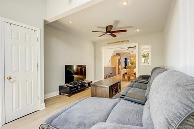 Welcome to 90-10 69th Avenue - a private, detached 2-family home - photo 4