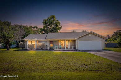 Welcome home to this charming 3-bedroom, 2-bath residence in the - photo 1
