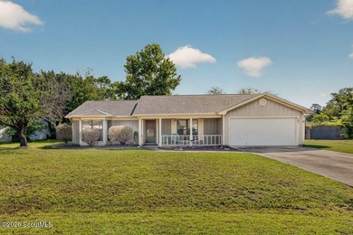 Welcome home to this charming 3-bedroom, 2-bath residence in the - photo 2