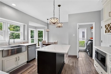 Welcome to 1070 Brockton Close, a beautifully updated 5-bedroom - photo 14
