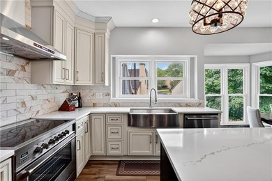 Welcome to 1070 Brockton Close, a beautifully updated 5-bedroom - photo 15