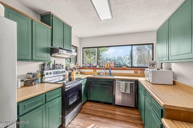 Welcome home to this charming 3-bedroom, 2-bath residence in the - photo 8