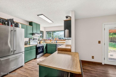 Welcome home to this charming 3-bedroom, 2-bath residence in the - photo 10