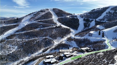 This exquisite ski-in/ski-out masterpiece is nestled in the - photo 2
