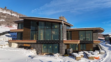 This exquisite ski-in/ski-out masterpiece is nestled in the - photo 3